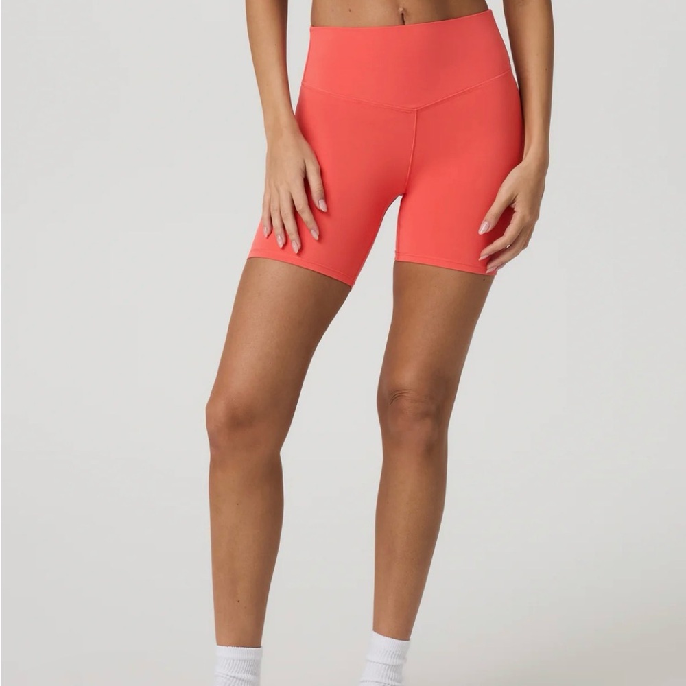Vuori alltheform bike shorts 6” in bright coral color